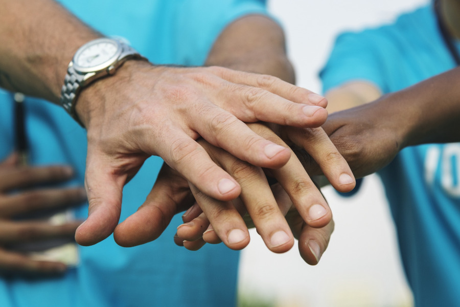 Hands reached out